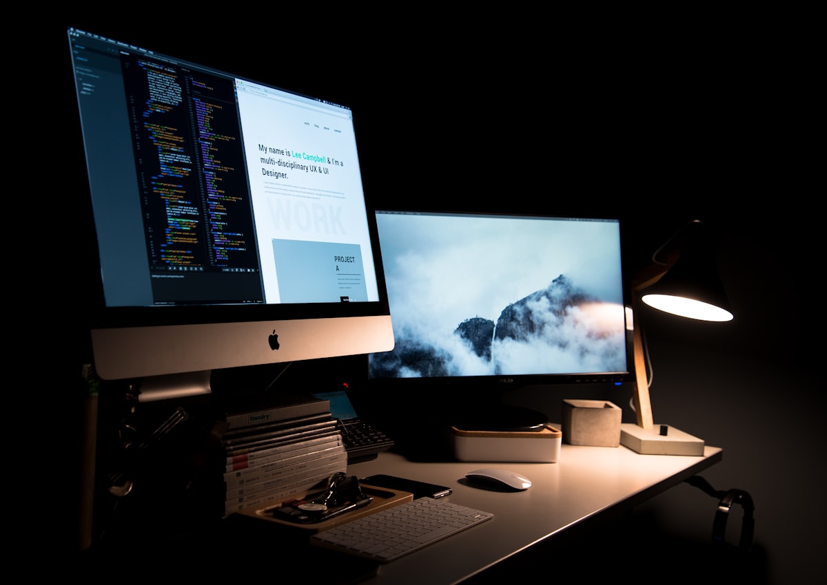 A web designer&rsquo;s workstation with a website open on screen